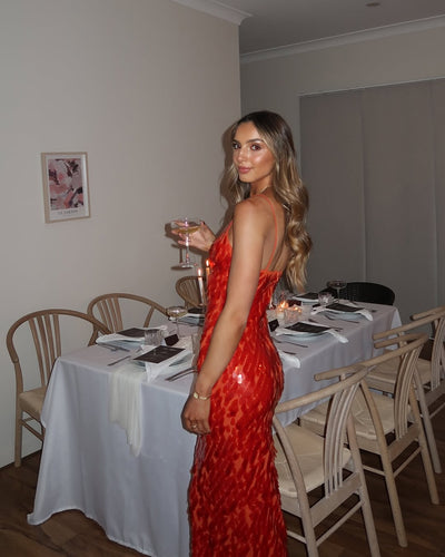 Selene – Sequin maxi dress with deep V-neck