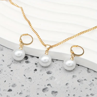 Leofwyn | Gold Pearl Dangle Jewelry Set