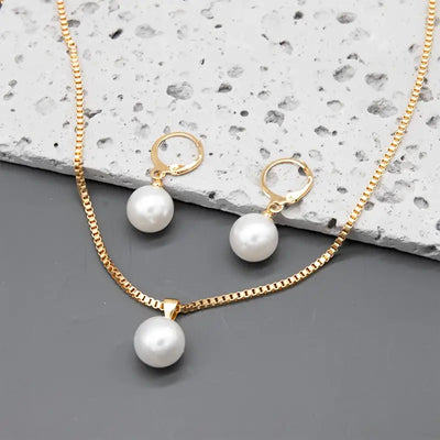 Leofwyn | Gold Pearl Dangle Jewelry Set